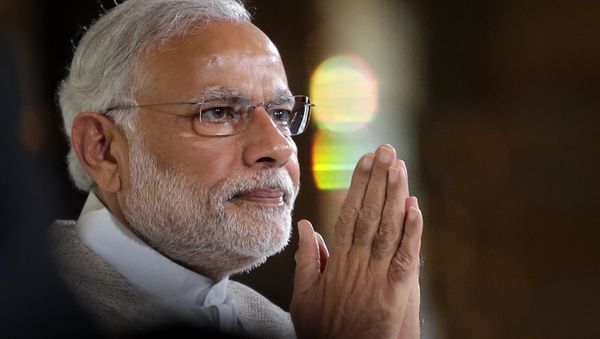 Indian Prime Minister Narendra Modi greets the audience as he prepares to deliver the 37th Singapore Lecture Monday, Nov. 23, 2015 Indian Prime Minister Narendra Modi greets the audience as he prepares to deliver the 37th Singapore Lecture Monday, Nov. 23, 2015 - Sputnik International