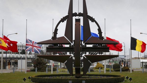 Flags fly at half mast at NATO headquarters in Brussels, March 23, 2016. Flags fly at half mast at NATO headquarters in Brussels, March 23, 2016. - Sputnik International