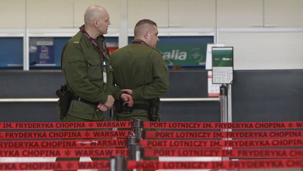 Border Guards patrol at Warsaw’s Frederic Chopin airport in Warsaw. - Sputnik International