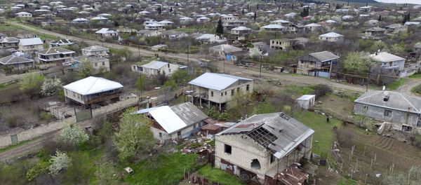 This aerial view shows destroyed houses during the fighting at Martakert province in the region of Nagorno-Karabakh, Azerbaijan, Monday, April 4, 2016 - Sputnik International