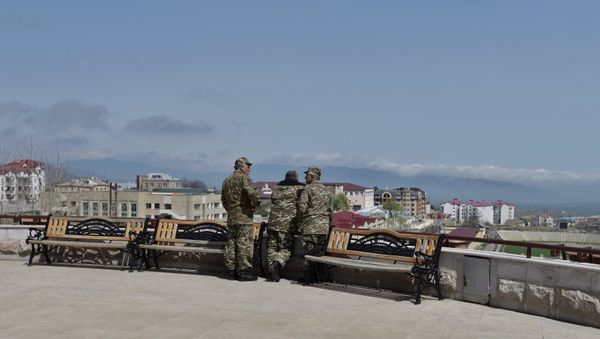 Uniformed men in Stepanakert, the unrecognized Nagorno-Karabakh Republic Uniformed men in Stepanakert, the unrecognized Nagorno-Karabakh Republic - Sputnik International