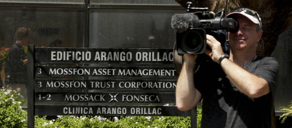 A cameraman films outside the Arango Orillac Building that lists the Mossack Fonseca law firm in Panama City, Tuesday, April 5, 2016 - Sputnik International