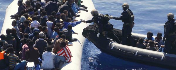German Navy sailors surround a boat with more than 100 migrants near the German combat supply ship 'Frankfurt am Main' during EUNAVFOR Med, also known as Operation Sophia, in the Mediterranean Sea off the coast of Libya, Tuesday, March 29, 2016 German Navy sailors surround a boat with more than 100 migrants near the German combat supply ship 'Frankfurt am Main' during EUNAVFOR Med, also known as Operation Sophia, in the Mediterranean Sea off the coast of Libya, Tuesday, March 29, 2016 - Sputnik International
