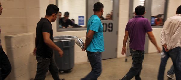 Immigrants who have been caught crossing the border illegally are housed inside the McAllen Border Patrol Station in McAllen, Texas, where they are processed on July 15, 2014 Immigrants who have been caught crossing the border illegally are housed inside the McAllen Border Patrol Station in McAllen, Texas, where they are processed on July 15, 2014 - Sputnik International