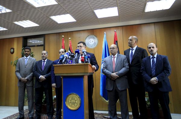 Libyan prime minister-designate under a proposed National Unity government Fayez Seraj (C) attends a news conference in Tripoli, Libya, March 30, 2016. Libyan prime minister-designate under a proposed National Unity government Fayez Seraj (C) attends a news conference in Tripoli, Libya, March 30, 2016. - Sputnik International