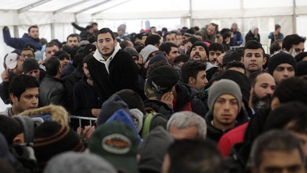 Hundreds of migrants waits in a tent to continue their registration process at the central registration center for refugees and asylum seekers LaGeSo (Landesamt fuer Gesundheit und Soziales - State Office for Health and Social Affairs) in Berlin (File) - Sputnik International