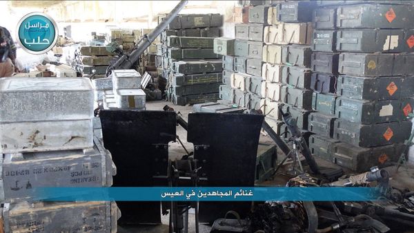 This image posted on the Twitter page of Syria's al-Qaida-linked Nusra Front on Saturday, April 2, 2016, shows boxes of ammunition and weapons captured by Nusra Front during the militants attack on the northern village of al-Ais in Aleppo province, Syria - Sputnik International