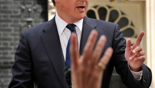 Britain's Prime Minister David Cameron addresses the media outside 10 Downing Street in London. Britain's Prime Minister David Cameron addresses the media outside 10 Downing Street in London. - Sputnik International