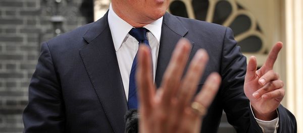 Britain's Prime Minister David Cameron addresses the media outside 10 Downing Street in London. Britain's Prime Minister David Cameron addresses the media outside 10 Downing Street in London. - Sputnik International