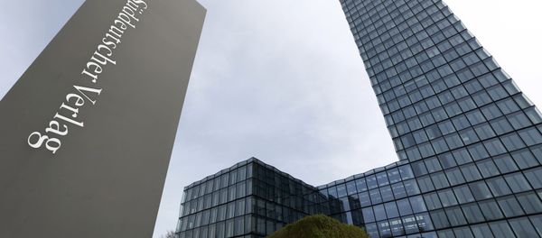 A logo of German publisher Sueddeutsche Verlag of German daily Sueddeutsche Zeitung is pictured in front of the main building in Munich, southern Germany, on April 5, 2016 A logo of German publisher Sueddeutsche Verlag of German daily Sueddeutsche Zeitung is pictured in front of the main building in Munich, southern Germany, on April 5, 2016 - Sputnik International