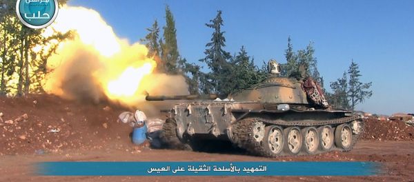 This image posted on the Twitter page of Syria's al-Qaida-linked Nusra Front on Friday, April 1, 2016, shows a Nusra Front tank firing at Syrian troops and pro-government gunmen in the northern village of al-Ais in Aleppo province, Syria - Sputnik International