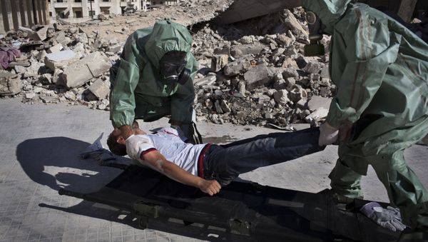 Volunteers take part in a simulation of how to respond to a chemical attack, in the northern Syrian city of Aleppo (File) Volunteers take part in a simulation of how to respond to a chemical attack, in the northern Syrian city of Aleppo (File) - Sputnik International