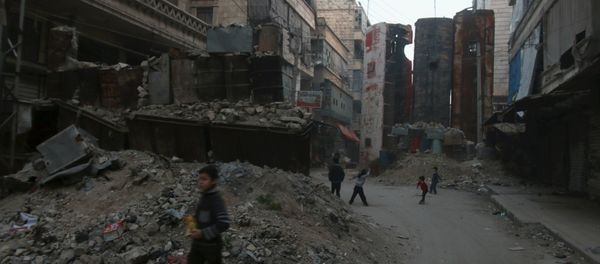 Children play near upright buses barricading a street, which serve as protection from snipers loyal to Syria's President Bashar al-Assad, in Aleppo's rebel-controlled Bustan al-Qasr neighbourhood, Syria April 6, 2016 Children play near upright buses barricading a street, which serve as protection from snipers loyal to Syria's President Bashar al-Assad, in Aleppo's rebel-controlled Bustan al-Qasr neighbourhood, Syria April 6, 2016 - Sputnik International