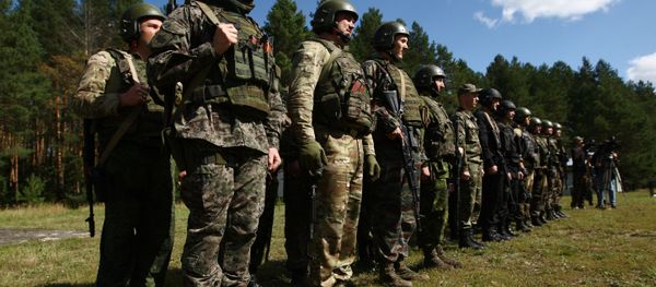 Participants in the open small arms shooting competitions of the task force units of law-enforcement bodies. (File) Participants in the open small arms shooting competitions of the task force units of law-enforcement bodies. (File) - Sputnik International