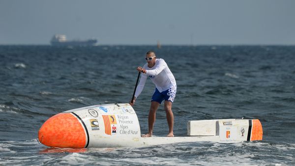 Nicolas Jarossay practicing on his Stand Up Paddel (SUP) off Martigues, as part of a training session ahead of his attempt to cross the Atlantic ocean in his specially designed SUP. (File) - Sputnik International
