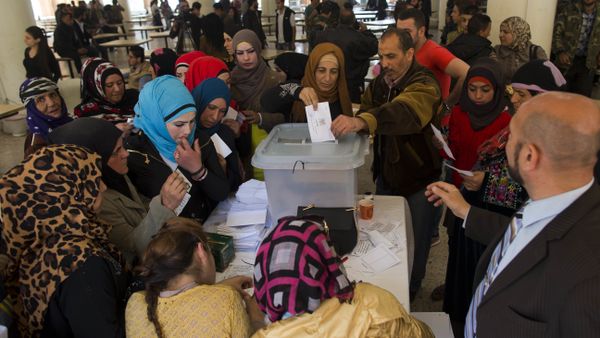 A Syrian woman casts her vote at a polling station during the Syrian parliamentary election in Damascus, Syria A Syrian woman casts her vote at a polling station during the Syrian parliamentary election in Damascus, Syria - Sputnik International
