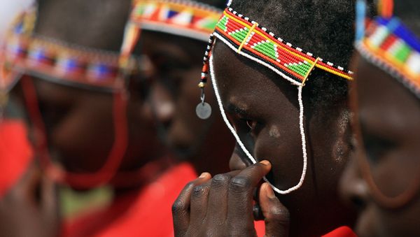 Kenyan teenage Maasai girls attend an alternative right of passage at Kilgoris, Trans Mara district, 220 kilometres north-west of the capital Nairobi, on April 19, 2008 at a ceremony organised by an anti-female genital mutilation, (FGM) campaign, Cherish Others Organisation. - Sputnik International