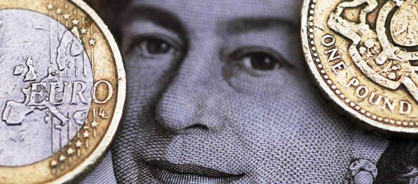 A two Euro coin is pictured next to a one Pound coin on top of a portrait of Britain's Queen Elizabeth in this file photo illustration shot March 16, 2016. A two Euro coin is pictured next to a one Pound coin on top of a portrait of Britain's Queen Elizabeth in this file photo illustration shot March 16, 2016. - Sputnik International