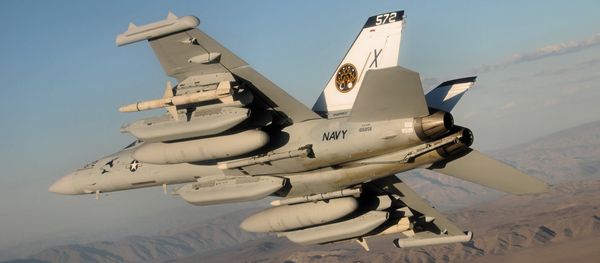 An EA-18G Growler (BuNo 166856) of test and evaluation squadron VX-9 Vampires, carrying a payload of external fuel tanks and missiles An EA-18G Growler (BuNo 166856) of test and evaluation squadron VX-9 Vampires, carrying a payload of external fuel tanks and missiles - Sputnik International