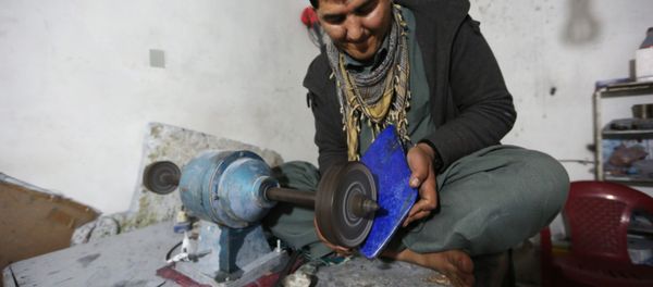 In this Monday, March 28, 2016 photo, an Afghan man works at a lapis lazuli factory in the city of Kabul, Afghanistan. - Sputnik International