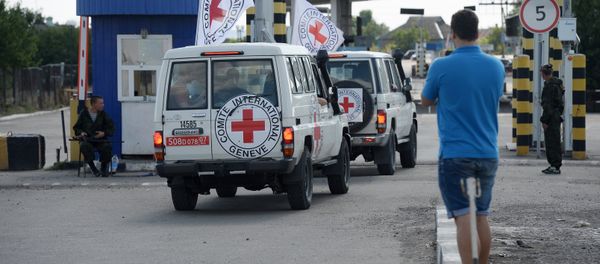 International Red Cross vans at Donetsk border crossing point (File) International Red Cross vans at Donetsk border crossing point (File) - Sputnik International