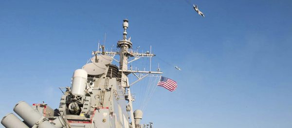 An U.S. Navy picture shows what appears to be a Russian Sukhoi SU-24 attack aircraft flying over the U.S. guided missile destroyer USS Donald Cook in the Baltic Sea in this picture taken April 12, 2016 and released April 13, 2016 An U.S. Navy picture shows what appears to be a Russian Sukhoi SU-24 attack aircraft flying over the U.S. guided missile destroyer USS Donald Cook in the Baltic Sea in this picture taken April 12, 2016 and released April 13, 2016 - Sputnik International
