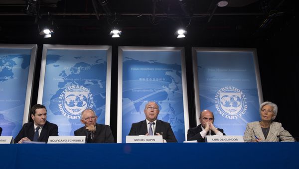 French Finance Minister Michel Sapin (C) speaks next to Chancellor of the Exchequer George Osborne (L), German Finance Minister Wolfgang Schauble (2nd L), Spanish Minister of Economy and Competitiveness Luis De Guindos (2nd R) and IMF Managing Director Christine Lagarde (R) during a press conference - Sputnik International