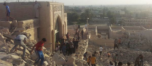 People walk on the rubble of the destroyed Mosque of The Prophet Younis, or Jonah, in Mosul, 225 miles (360 kilometers) northwest of Baghdad, Iraq (File) People walk on the rubble of the destroyed Mosque of The Prophet Younis, or Jonah, in Mosul, 225 miles (360 kilometers) northwest of Baghdad, Iraq (File) - Sputnik International