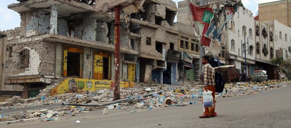 A picture taken on April 7, 2016, shows heavily damaged buildings on a street in Yemen's third city Taez as a result of clashes between Shiite Huthi rebels and fighters from the Popular Resistance Committees, loyal to Yemen's fugitive President Abedrabbo Mansour Hadi. A picture taken on April 7, 2016, shows heavily damaged buildings on a street in Yemen's third city Taez as a result of clashes between Shiite Huthi rebels and fighters from the Popular Resistance Committees, loyal to Yemen's fugitive President Abedrabbo Mansour Hadi. - Sputnik International