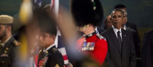 U.S. President Barack Obama watches as a British military flag bearer walks away (File) U.S. President Barack Obama watches as a British military flag bearer walks away (File) - Sputnik International