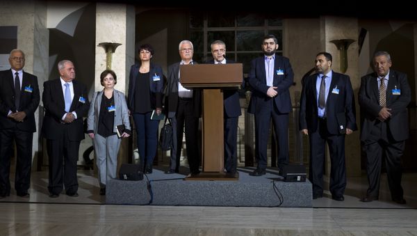 Delegation members of the main Syrian opposition body, the High Negotiations Committee (HCN), delegation head Asaad al-Zoabi (C), delegate George Sabra (5th L) and HNC chief negotiator and Army of Islam rebel group's leading member Mohammed Alloush (3rd R) attend a press conference following Syria peace talks at the United Nations Office on April 13, 2016 in Geneva Delegation members of the main Syrian opposition body, the High Negotiations Committee (HCN), delegation head Asaad al-Zoabi (C), delegate George Sabra (5th L) and HNC chief negotiator and Army of Islam rebel group's leading member Mohammed Alloush (3rd R) attend a press conference following Syria peace talks at the United Nations Office on April 13, 2016 in Geneva - Sputnik International