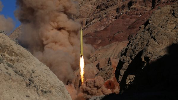 A Qadr H long-range ballistic surface-to-surface missile is fired by Iran's powerful Revolutionary Guard during a maneuver. file photo A Qadr H long-range ballistic surface-to-surface missile is fired by Iran's powerful Revolutionary Guard during a maneuver. file photo - Sputnik International