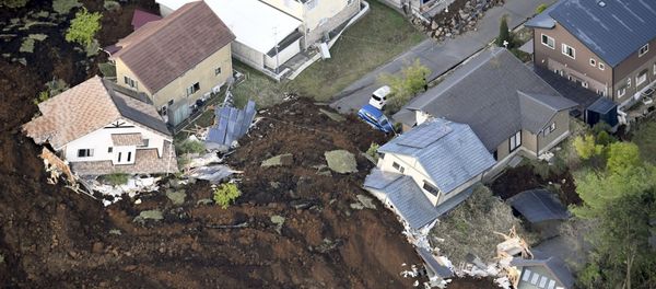 The aftermath of a landslide and destroyed houses caused by an earthquake are seen in Minamiaso town, Kumamoto prefecture, southern Japan, in this photo taken by Kyodo April 16, 2016 The aftermath of a landslide and destroyed houses caused by an earthquake are seen in Minamiaso town, Kumamoto prefecture, southern Japan, in this photo taken by Kyodo April 16, 2016 - Sputnik International