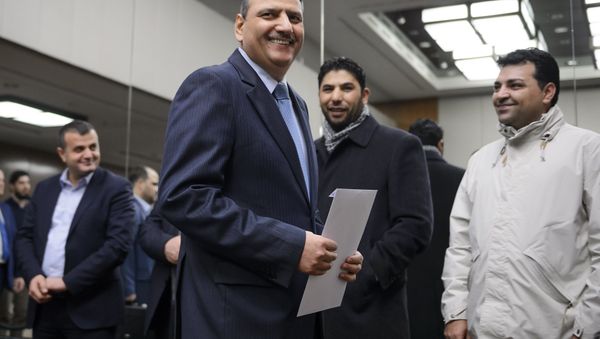 Syrian opposition chief Riad Hijab (C) arrives to a press conference after Syrian peace talks  in Geneva (File) - Sputnik International