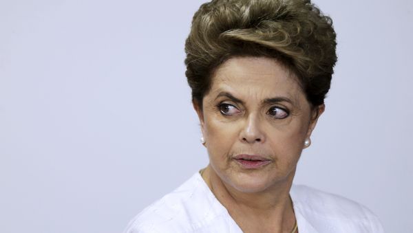 Brazil's President Dilma Rousseff looks on during signing of federal land transfer agreement for the government of the state of Amapa at Planalto Palace in Brasilia, Brazil, April 15, 2016 Brazil's President Dilma Rousseff looks on during signing of federal land transfer agreement for the government of the state of Amapa at Planalto Palace in Brasilia, Brazil, April 15, 2016 - Sputnik International