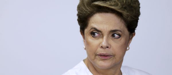 Brazil's President Dilma Rousseff looks on during signing of federal land transfer agreement for the government of the state of Amapa at Planalto Palace in Brasilia, Brazil, April 15, 2016 Brazil's President Dilma Rousseff looks on during signing of federal land transfer agreement for the government of the state of Amapa at Planalto Palace in Brasilia, Brazil, April 15, 2016 - Sputnik International