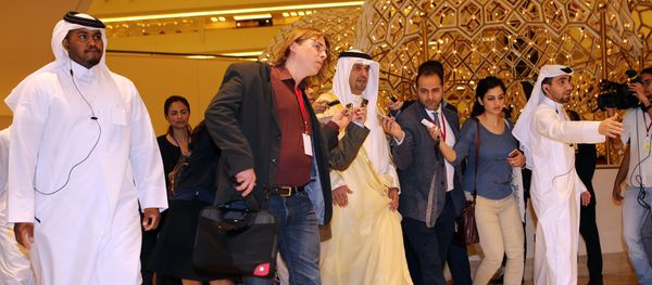 Kuwaiti Minister of Finance and Minister of Oil Anas al-Saleh (C) arrives for the organization of Petroleum Exporting Countries (OPEC) meeting, in the Qatari capital Doha, on April 17, 2016 Kuwaiti Minister of Finance and Minister of Oil Anas al-Saleh (C) arrives for the organization of Petroleum Exporting Countries (OPEC) meeting, in the Qatari capital Doha, on April 17, 2016 - Sputnik International