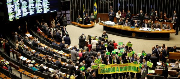Lower house members who support the impeachment demonstrate during a session to review the request for Brazilian President Dilma Rousseff's impeachment, at the Chamber of Deputies in Brasilia, Brazil April 15, 2016 Lower house members who support the impeachment demonstrate during a session to review the request for Brazilian President Dilma Rousseff's impeachment, at the Chamber of Deputies in Brasilia, Brazil April 15, 2016 - Sputnik International