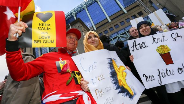 People take part in a rally called The march against the fear, Tous Ensemble, Samen Een, All Together in memory of the victims of bomb attacks in Brussels metro and Brussels international airport of Zaventem in Brussels, Belgium, April 17, 2016 - Sputnik International