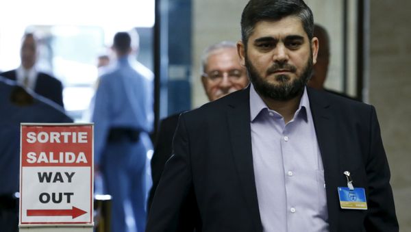 Mohamed Alloush of the Jaysh al Islam arrives with the delegation of the High Negotiations Committee (HNC) for a meeting with U.N. mediator Staffan de Mistura during Syria Peace talks at the United Nations in Geneva, Switzerland, April 13, 2016 Mohamed Alloush of the Jaysh al Islam arrives with the delegation of the High Negotiations Committee (HNC) for a meeting with U.N. mediator Staffan de Mistura during Syria Peace talks at the United Nations in Geneva, Switzerland, April 13, 2016 - Sputnik International