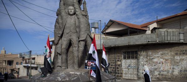 Druse participate in a rally, demanding the return of the Golan Heights, captured by Israel in 1967, close to the Syrian border in Buqata in the Golan Heights, Sunday, Feb. 14, 2016 Druse participate in a rally, demanding the return of the Golan Heights, captured by Israel in 1967, close to the Syrian border in Buqata in the Golan Heights, Sunday, Feb. 14, 2016 - Sputnik International