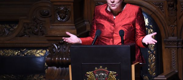 German Chancellor Angela Merkel speaks during the Matthiae Dinner attended by British Prime Minister David Cameron in Hamburg, northern Germany on February 12, 2016. - Sputnik International