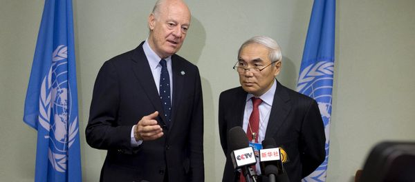 U.N. Special Envoy for Syria Staffan de Mistura (L) addresses the media with China's Special Envoy for Syria Xie Xiaoyan on the sidelines of Syrian peace talks at the United Nations in Geneva, Switzerland, April 18, 2016. - Sputnik International