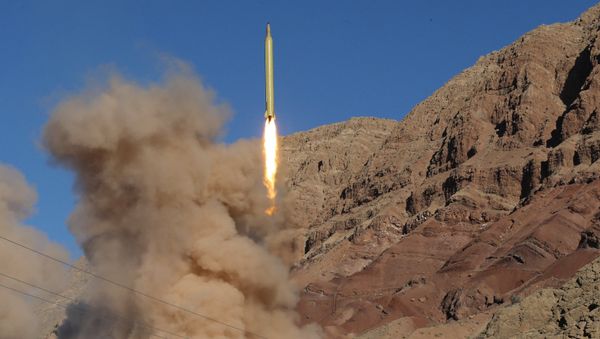 A long-range Qadr ballistic missile is launched in the Alborz mountain range in northern Iran on March 9, 2016. (File) A long-range Qadr ballistic missile is launched in the Alborz mountain range in northern Iran on March 9, 2016. (File) - Sputnik International