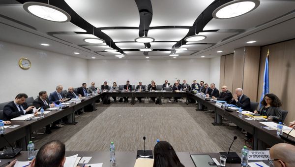 Syrian Ambassador to the United Nations (UN) and Head of the Government delegation Bashar al-Jaafari (3rd L) faces UN Special Envoy of the Secretary-General for Syria Staffan de Mistura (2nd R) at the opening of a new round of negotiations of peace talks on Syria at the United Nations Office in Geneva in this March 21, 2016 (File photo) - Sputnik International
