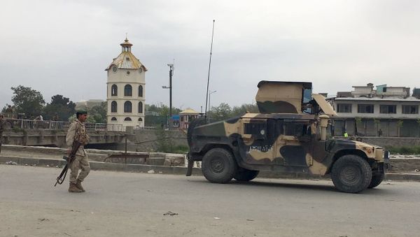 Afghan security forces respond to a Taliban-claimed suicide attack in Kabul, Afghanistan, Tuesday, April 19, 2016. Afghan security forces respond to a Taliban-claimed suicide attack in Kabul, Afghanistan, Tuesday, April 19, 2016. - Sputnik International