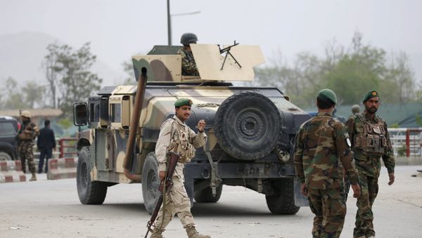 Afghan National Army (ANA) arrive at the site of a suicide car bomb attack in Kabul, Afghanistan April 19, 2016. Afghan National Army (ANA) arrive at the site of a suicide car bomb attack in Kabul, Afghanistan April 19, 2016. - Sputnik International