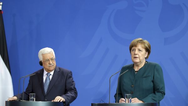German Chancellor Angela Merkel, right, and Palestinian President Mahmoud Abbas, left, address the media during a joint news conference as part of a meeting at the chancellery in Berlin, Germany, Tuesday, April 19, 2016. German Chancellor Angela Merkel, right, and Palestinian President Mahmoud Abbas, left, address the media during a joint news conference as part of a meeting at the chancellery in Berlin, Germany, Tuesday, April 19, 2016. - Sputnik International