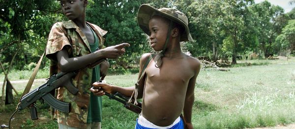 Two children enrolled with Sierra Leonean troops fighting rebels of the Revolutionary United Front (RUF). Two children enrolled with Sierra Leonean troops fighting rebels of the Revolutionary United Front (RUF). - Sputnik International