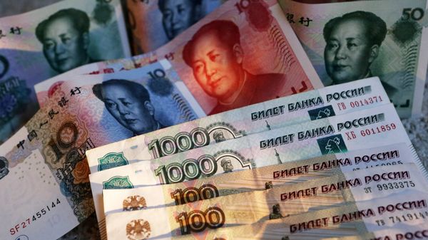 Rubles and yuans - Sputnik International